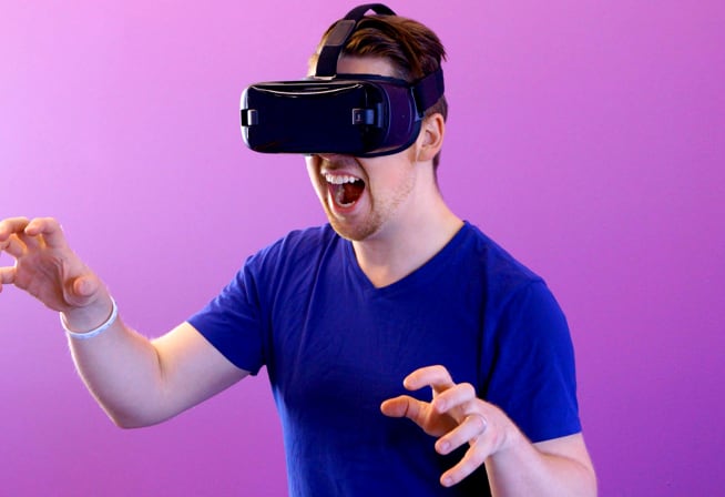 A man wearing a virtual reality headset